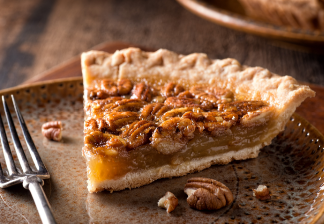A slice of homemade pecan pie