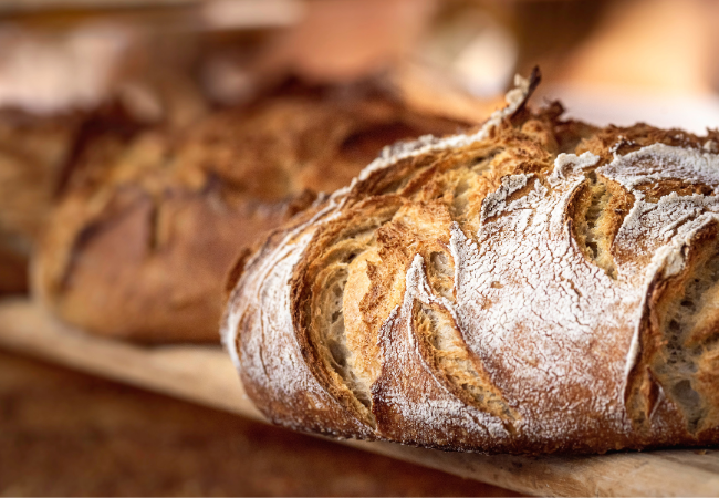 Golden brown crusty sourdough bread loaf