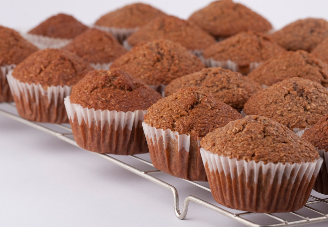 freshly baked bran muffins on a tray