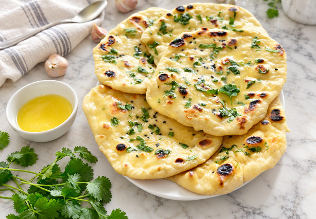 Skillet baked Indian naan with garlic cilantro butter